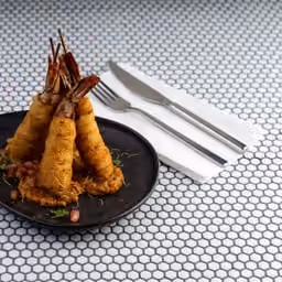 Gamberoni fritti in pastella croccante